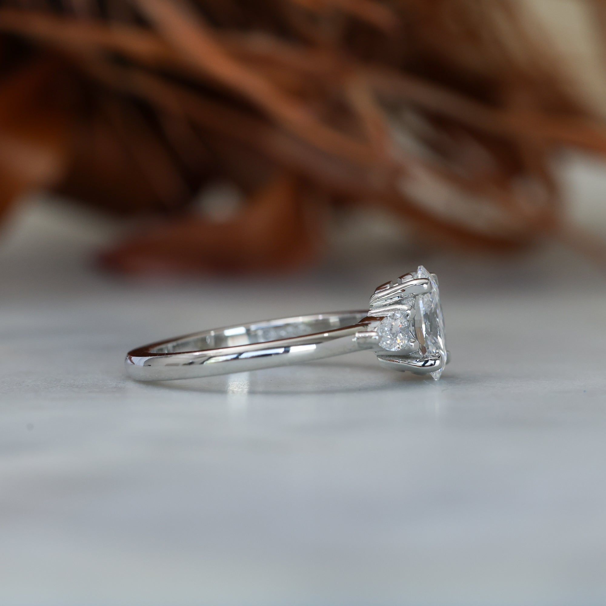 1.00ct oval cut diamond trilogy engagement ring platinum