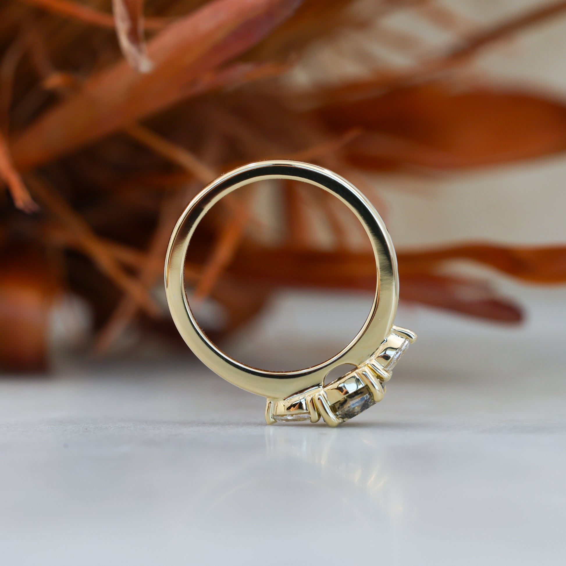 natural hexagon cut salt and pepper champagne diamond trilogy engagement ring yellow gold