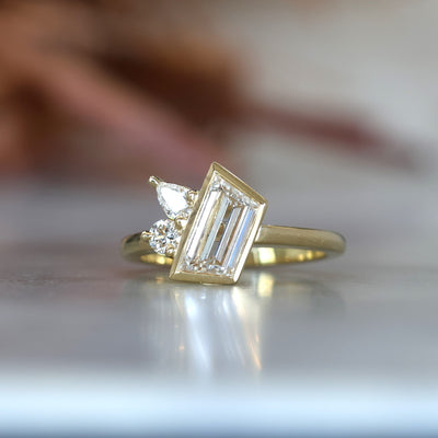 1.02ct Trapeze cut diamond Bezel Asymmetrical Set Engagement ring close up front view