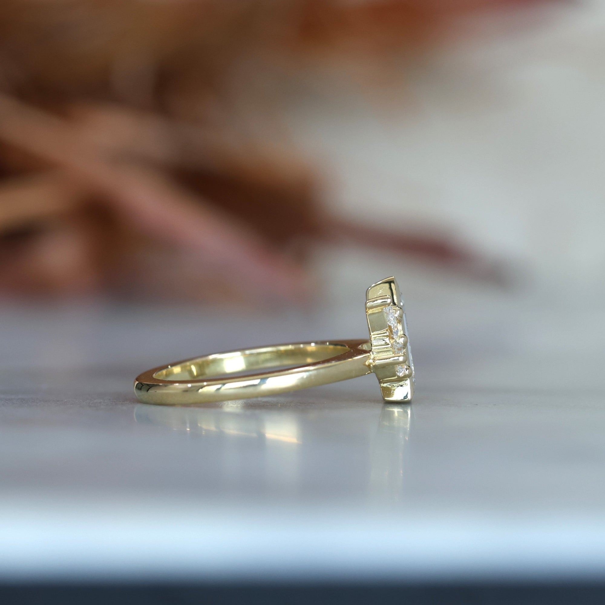 1.02ct Trapeze cut diamond Bezel Set Engagement ring side view - yellow gold ring