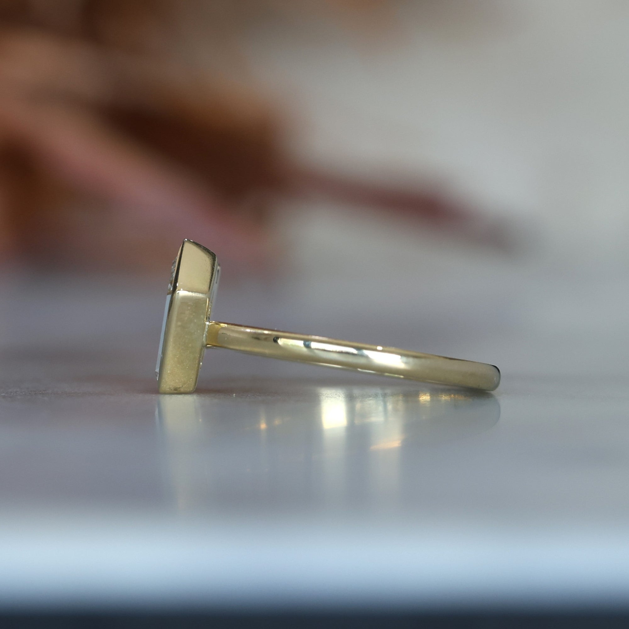 1.02ct Trapeze cut diamond Bezel Set Engagement ring side view