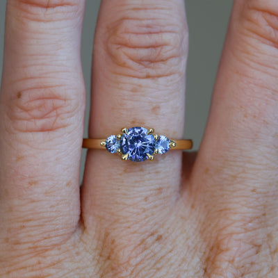 1.07ct ceylon sapphire triple lunar trilogy engagement ring on hand