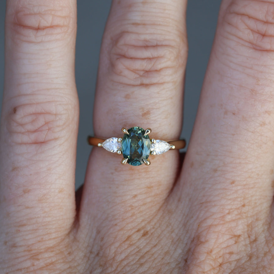 1.11ct oval cut australian sapphire trilogy engagement ring