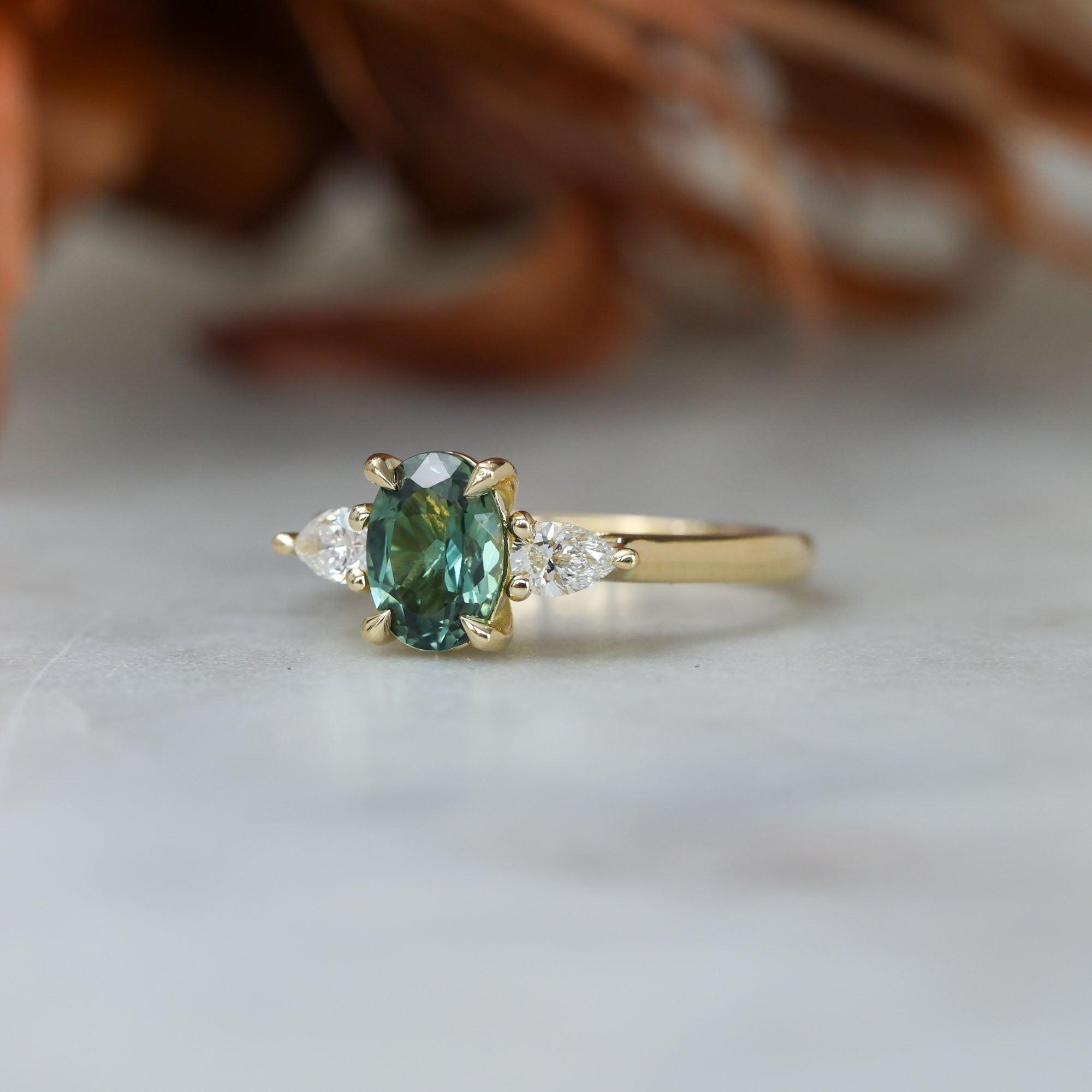 1.11ct oval cut australian sapphire trilogy engagement ring