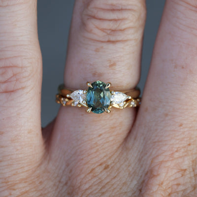 1.11ct oval cut australian sapphire trilogy engagement ring with wedding band