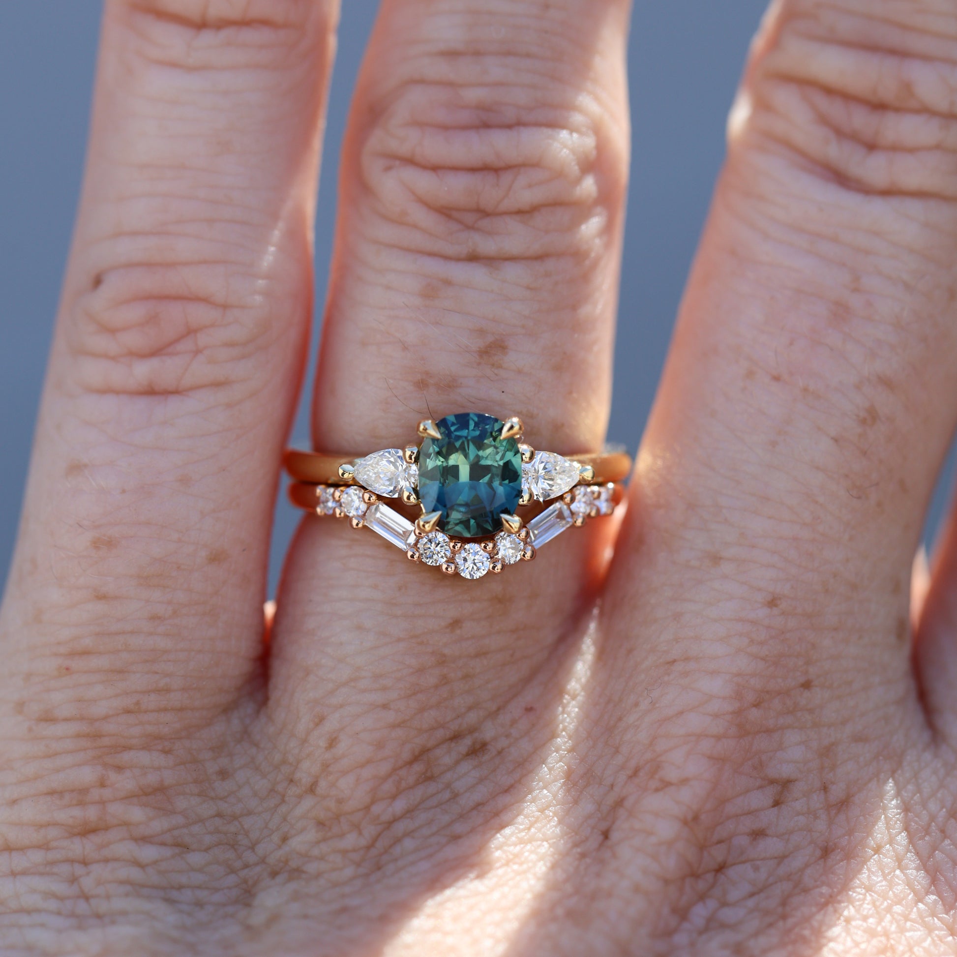 1.12ct cushion cut australian sapphire engagement ring on hand