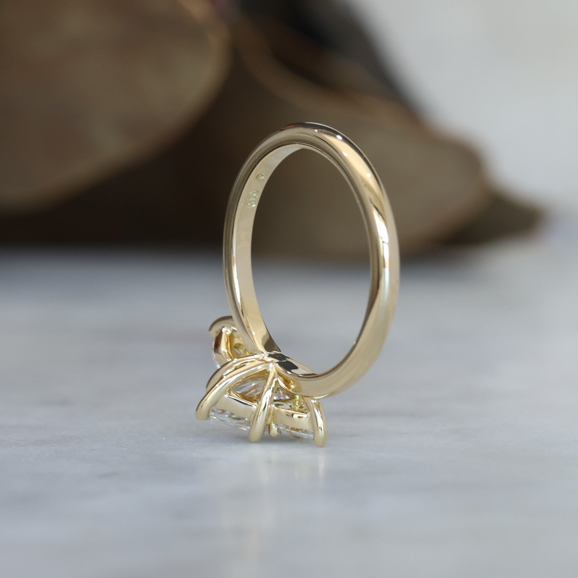 1.15ct Elongated Hexagon Diamond trilogy engagement ring