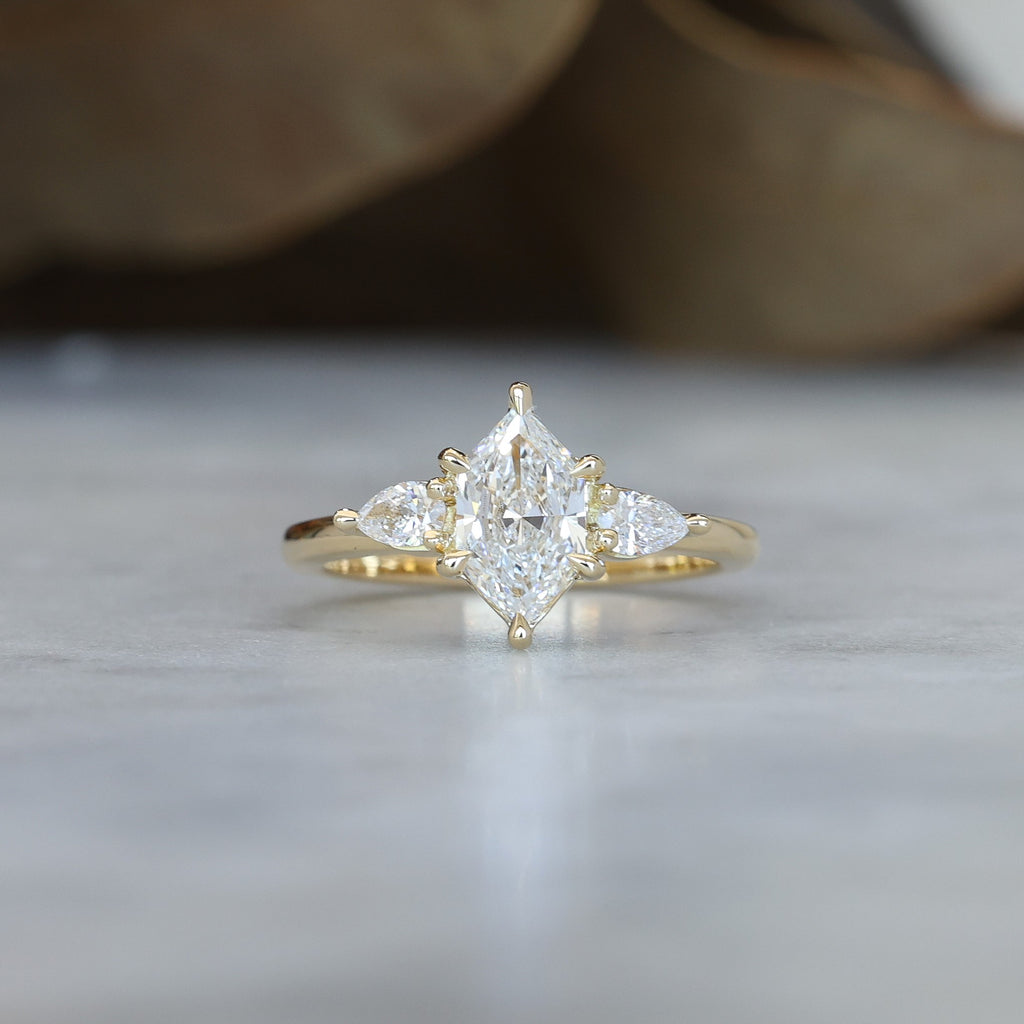 1.15ct Elongated Hexagon Diamond trilogy engagement ring