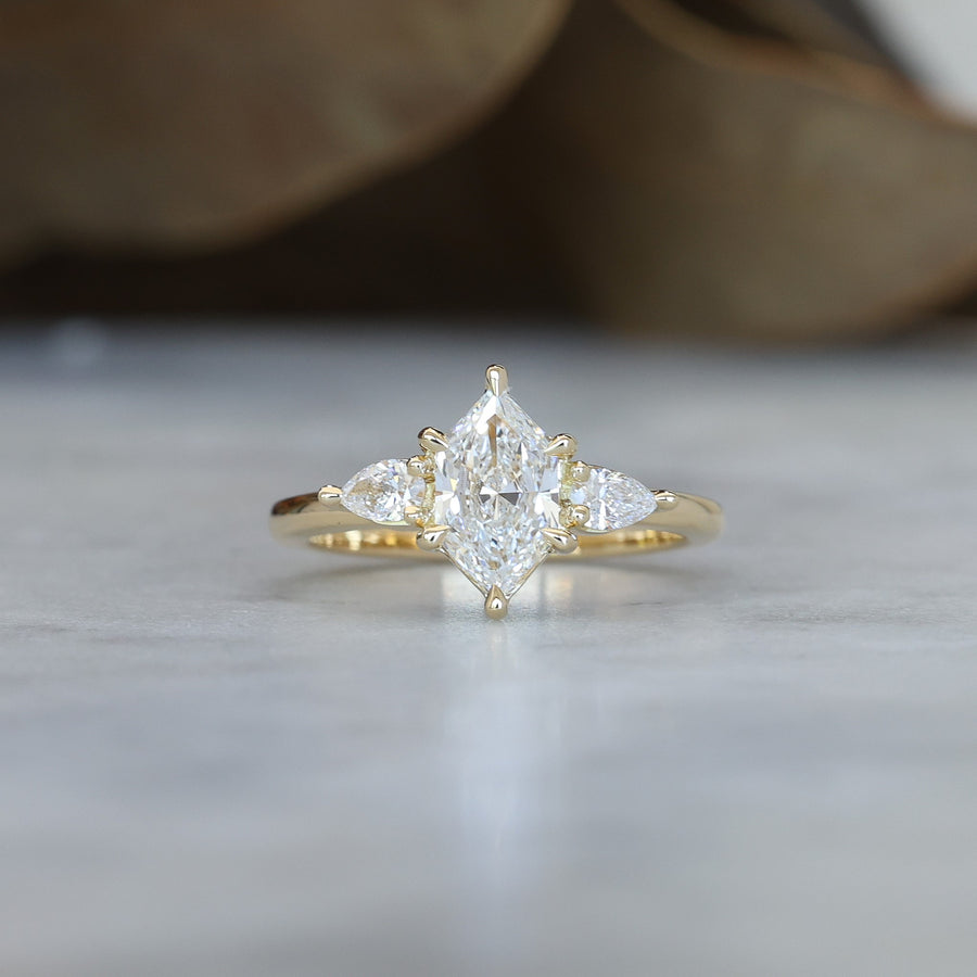 1.15ct Elongated Hexagon Diamond trilogy engagement ring