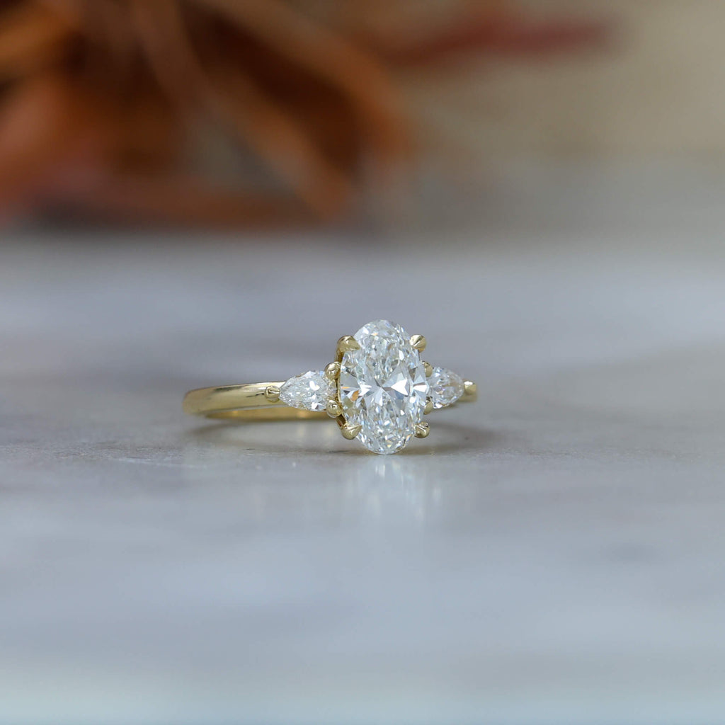 1.18ct Oval Lab Diamond trilogy Engagement ring, in 18ct yellow gold