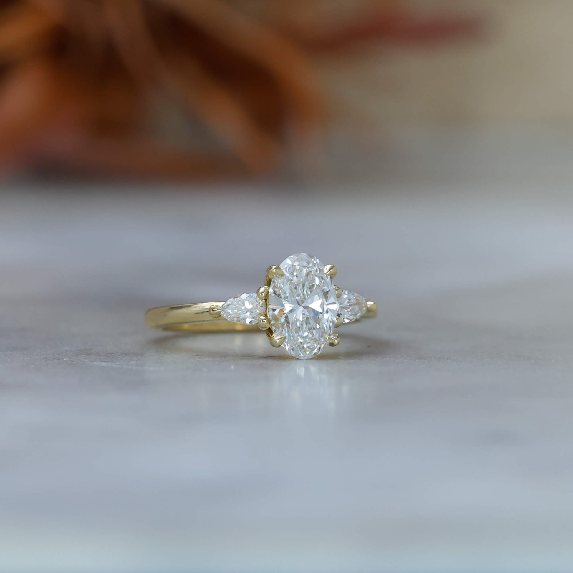 1.18ct Oval Lab Diamond trilogy Engagement ring, in 18ct yellow gold