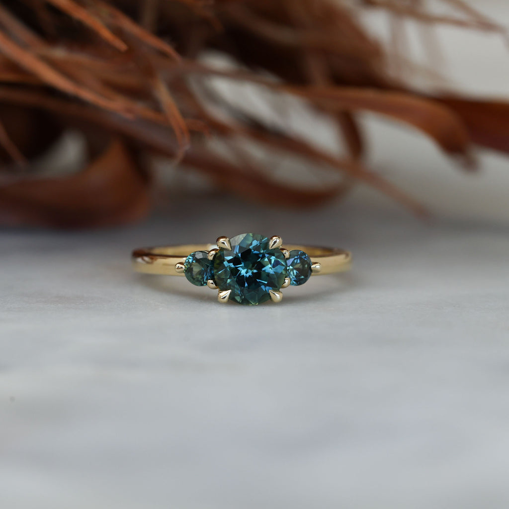 1.19ct round cut australian parti sapphire trilogy engagement ring