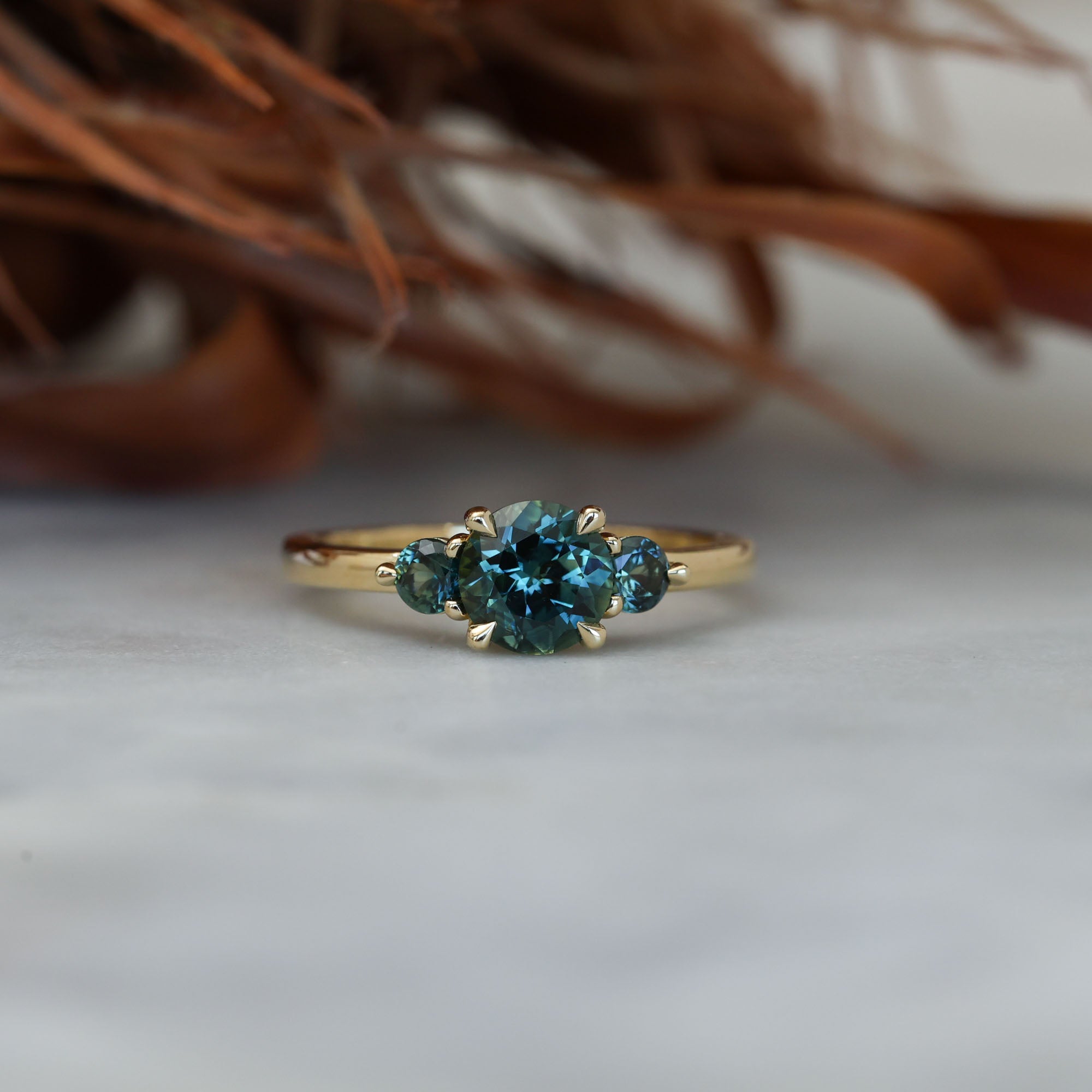 1.19ct round cut australian parti sapphire trilogy engagement ring