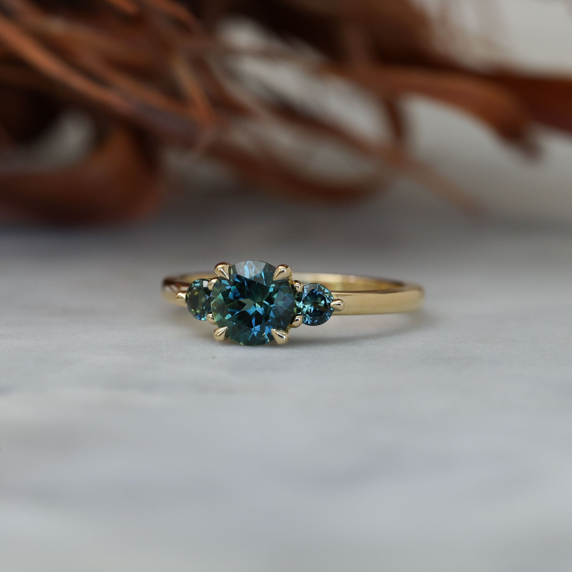 1.19ct round cut australian parti sapphire trilogy engagement ring