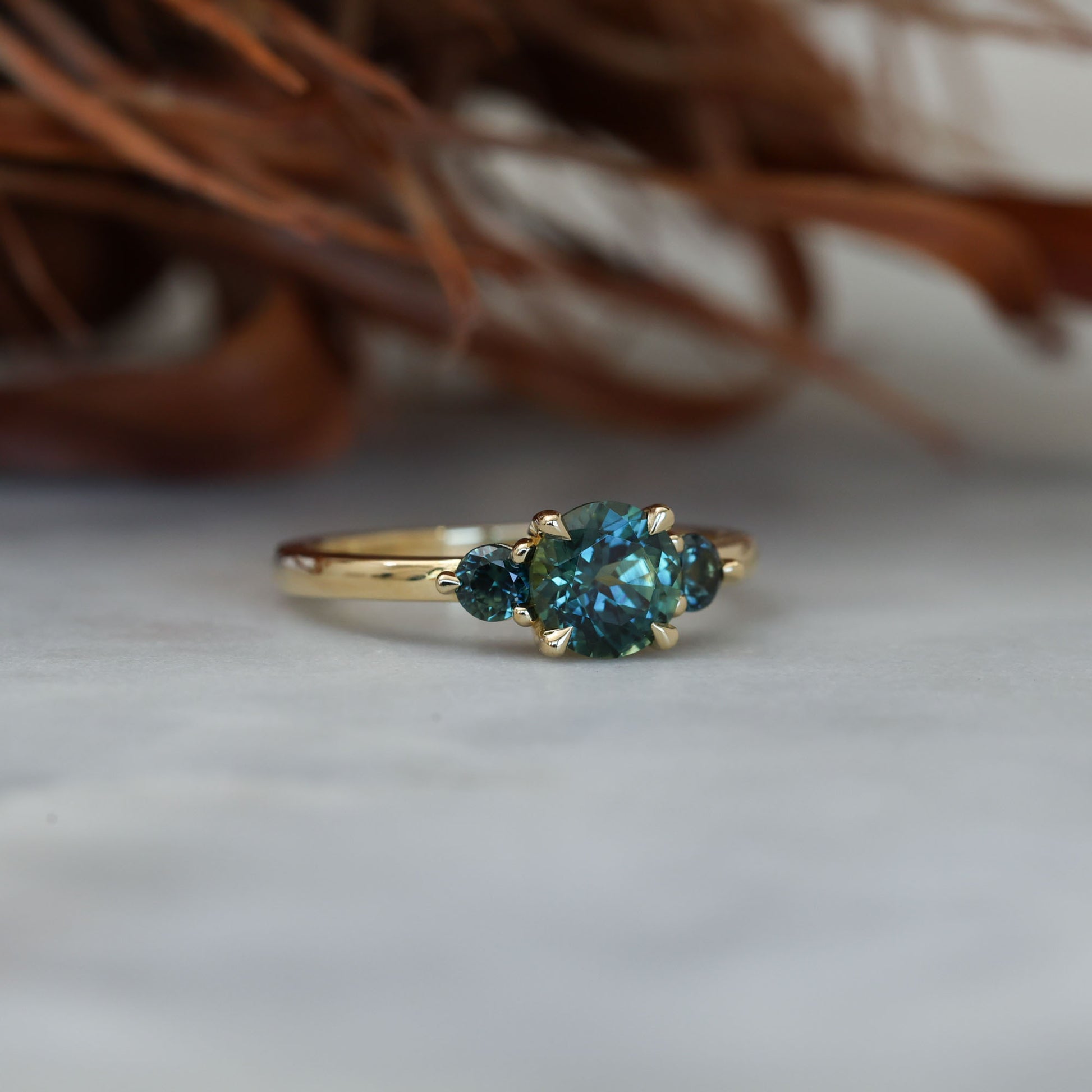 1.19ct round cut australian parti sapphire trilogy engagement ring