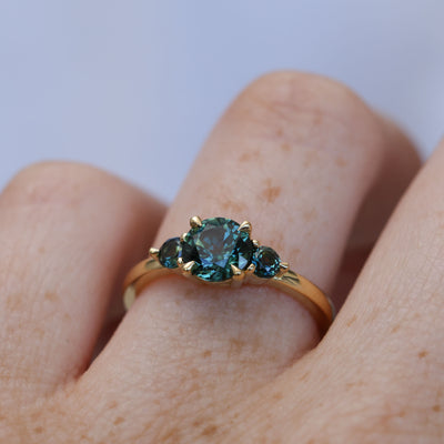 1.19ct round cut australian parti sapphire trilogy engagement ring