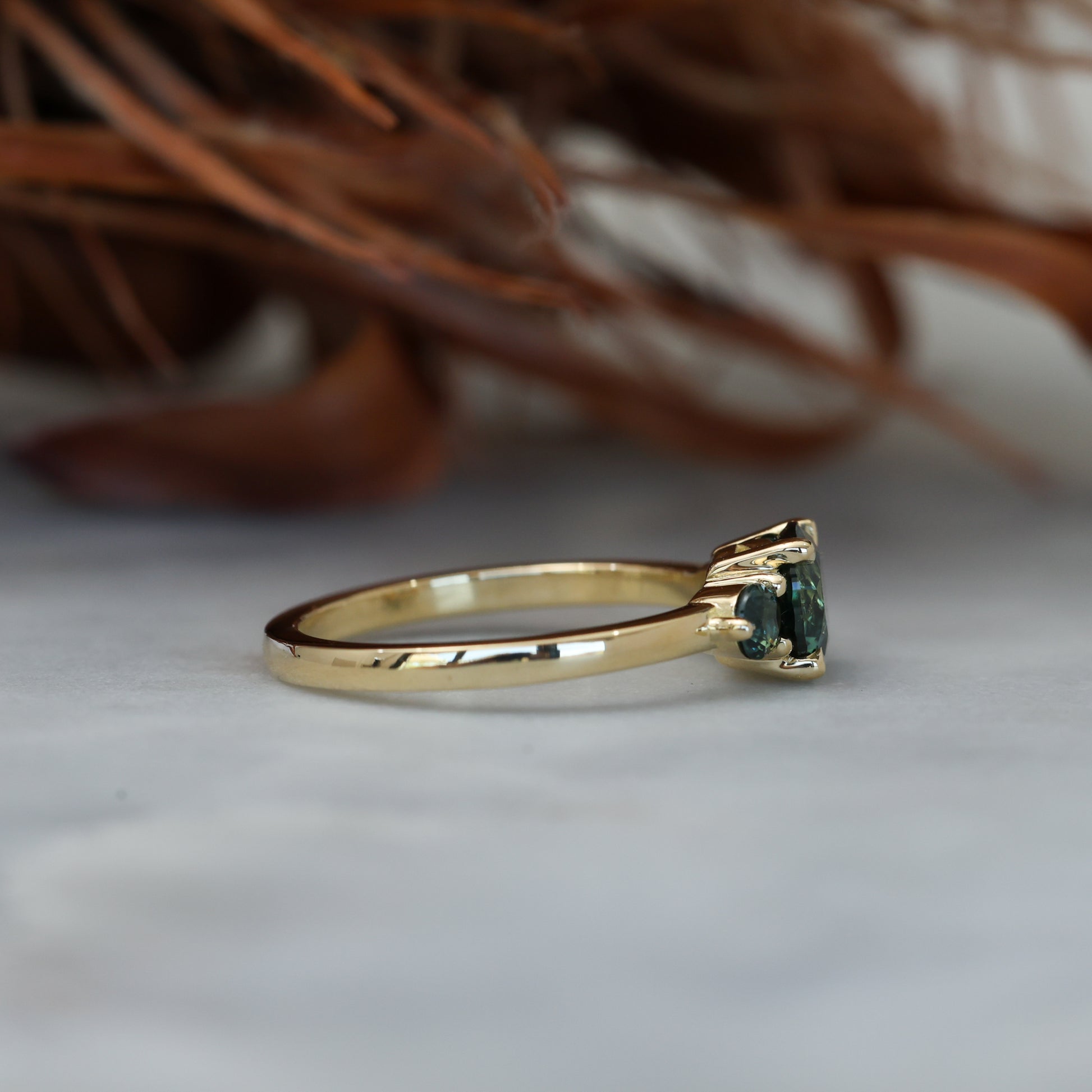 1.19ct round cut australian parti sapphire trilogy engagement ring