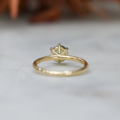 1.20ct round cut madagascan sapphire solitaire engagement ring, set in 18ct yellow gold back view