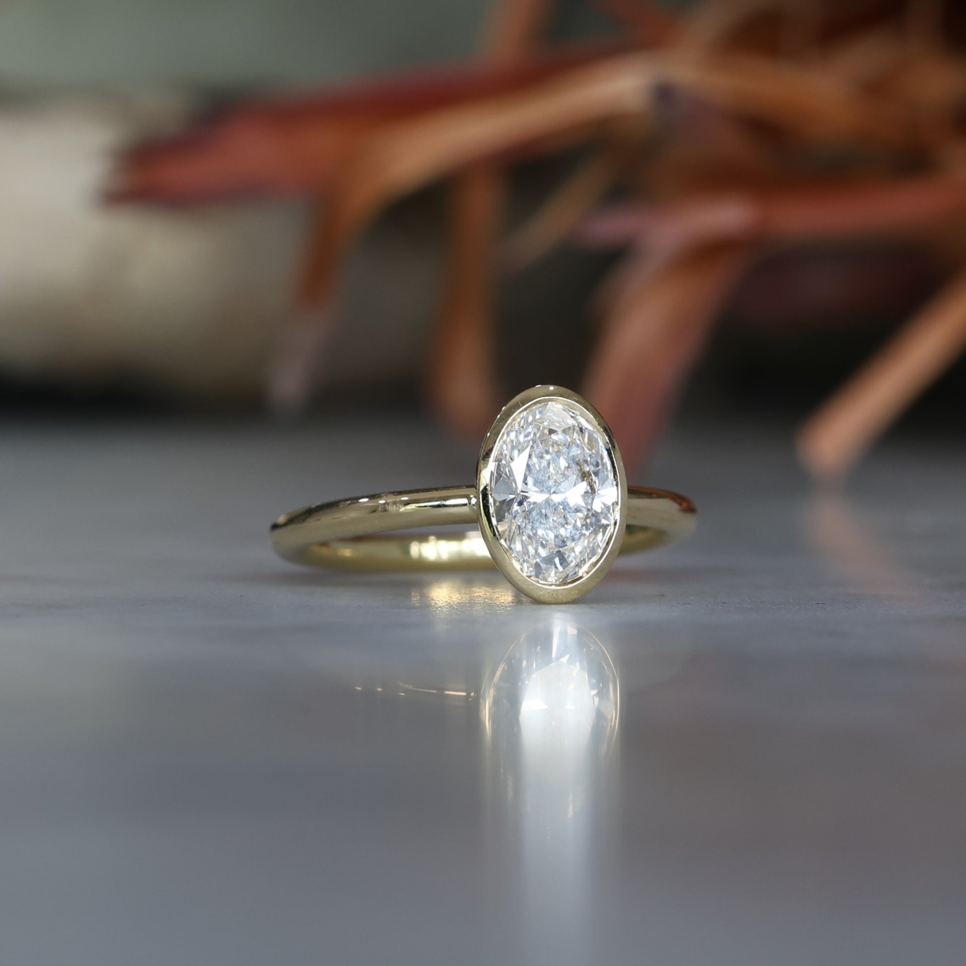 1.22ct Oval Diamond bezel engagement ring
