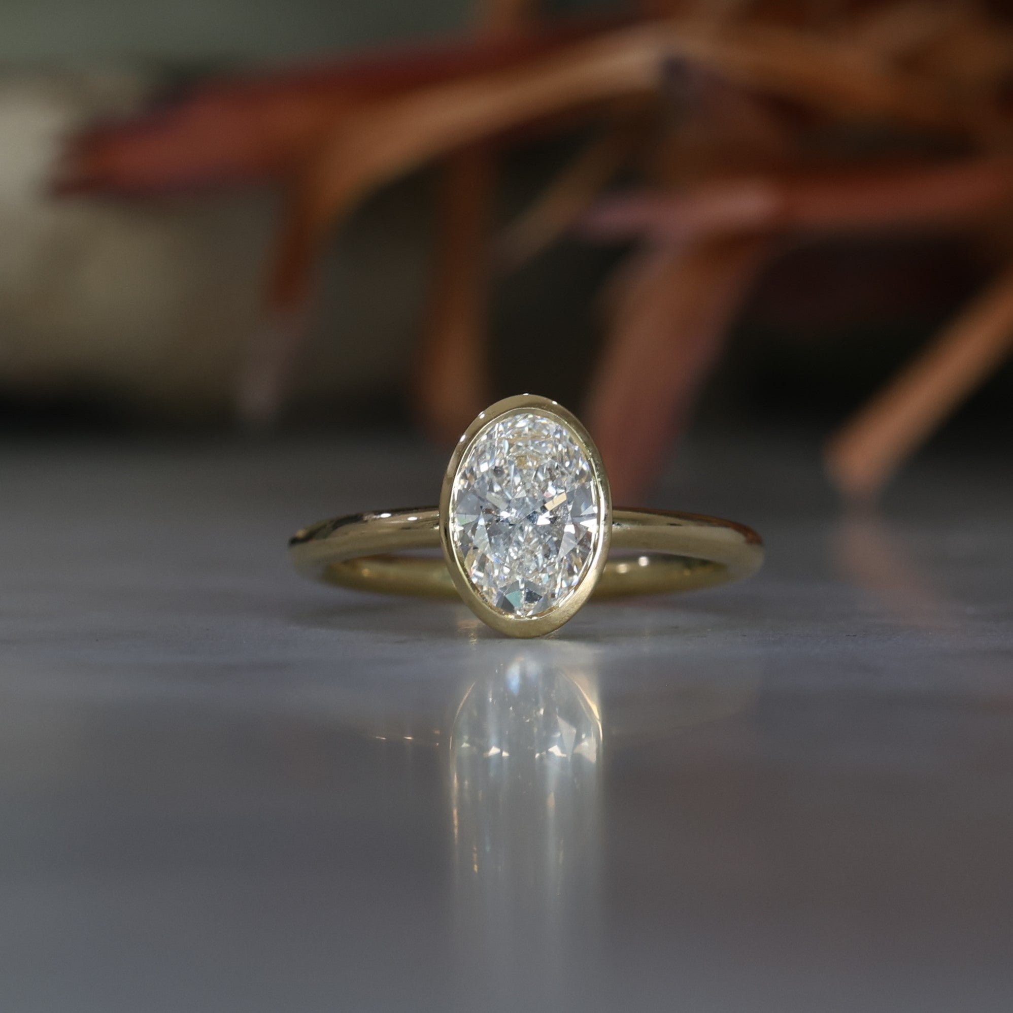 1.22ct Oval Diamond bezel engagement ring
