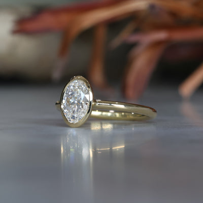 1.22ct Oval Diamond bezel engagement ring