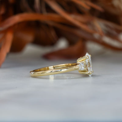 1.25ct oval cut diamond may trilogy engagement ring