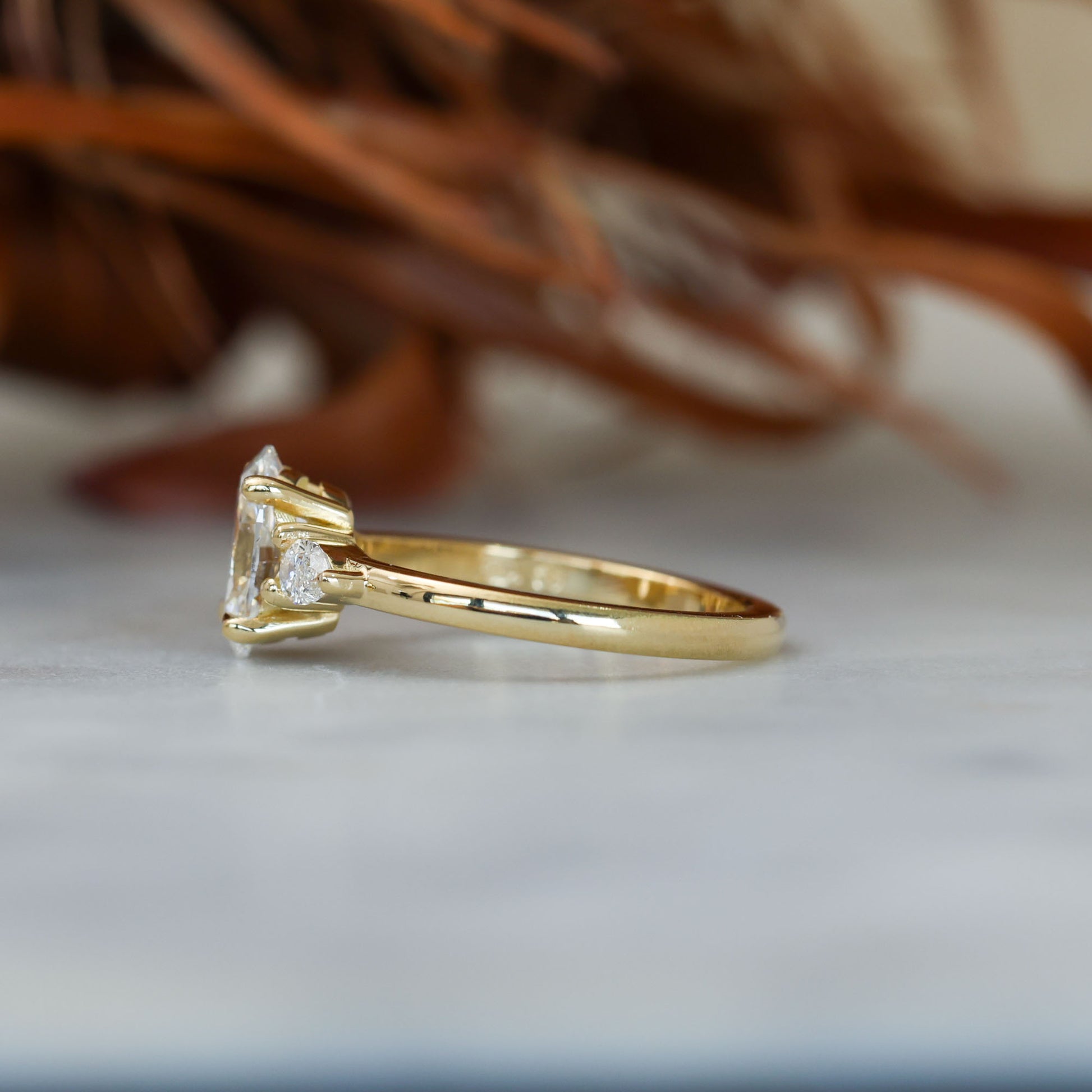 1.25ct oval cut diamond may trilogy engagement ring