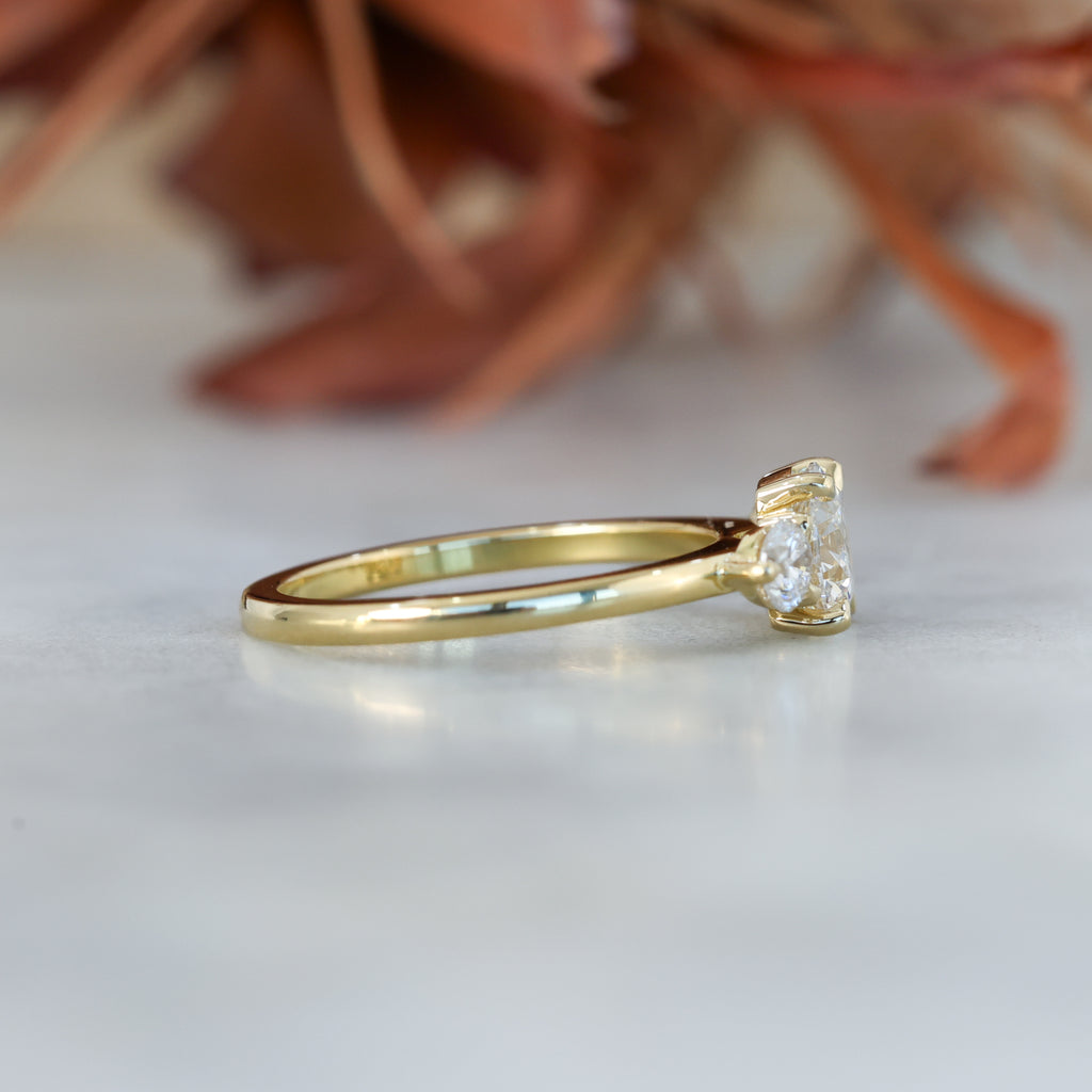 diamond round cut trilogy engagement ring yellow gold