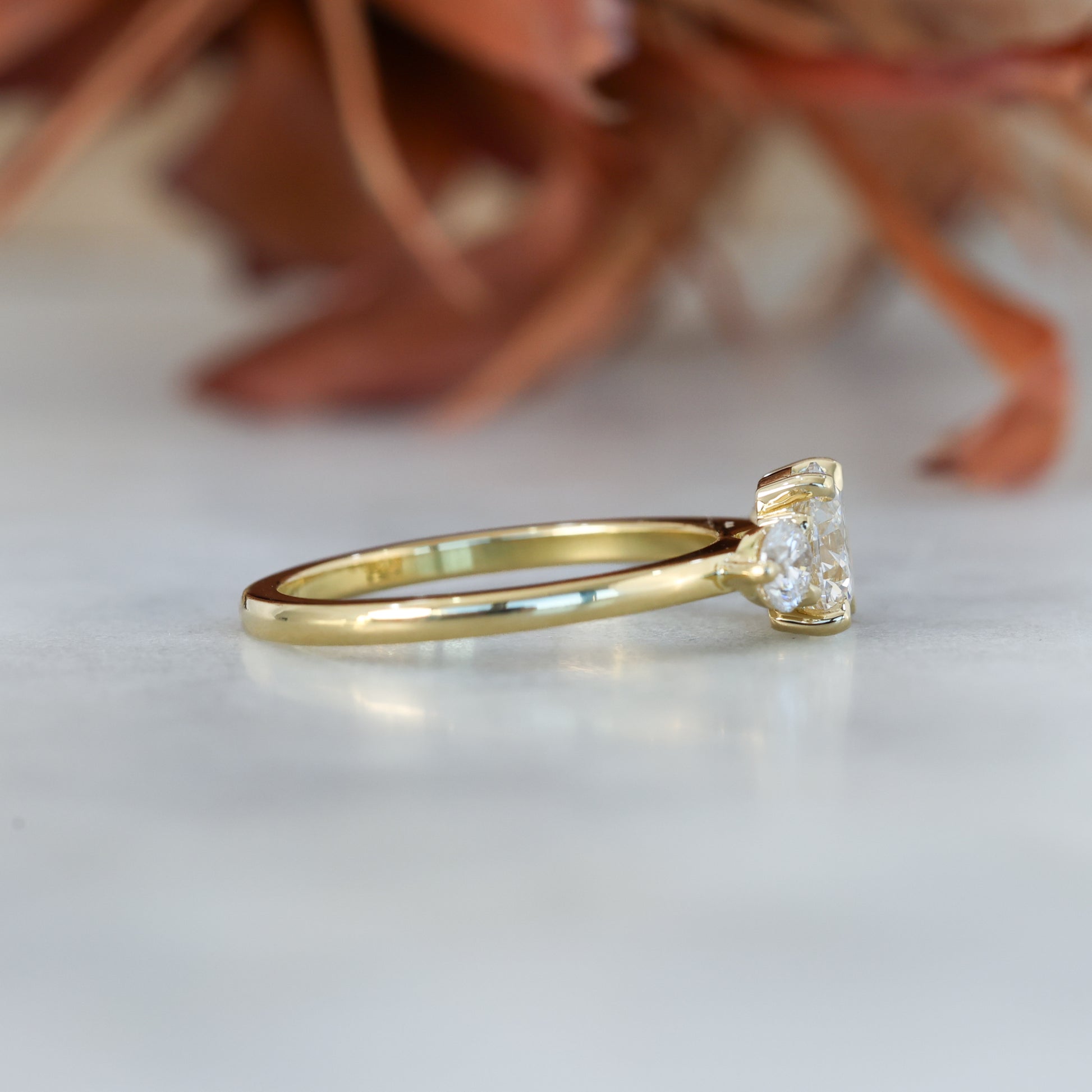 diamond round cut trilogy engagement ring yellow gold