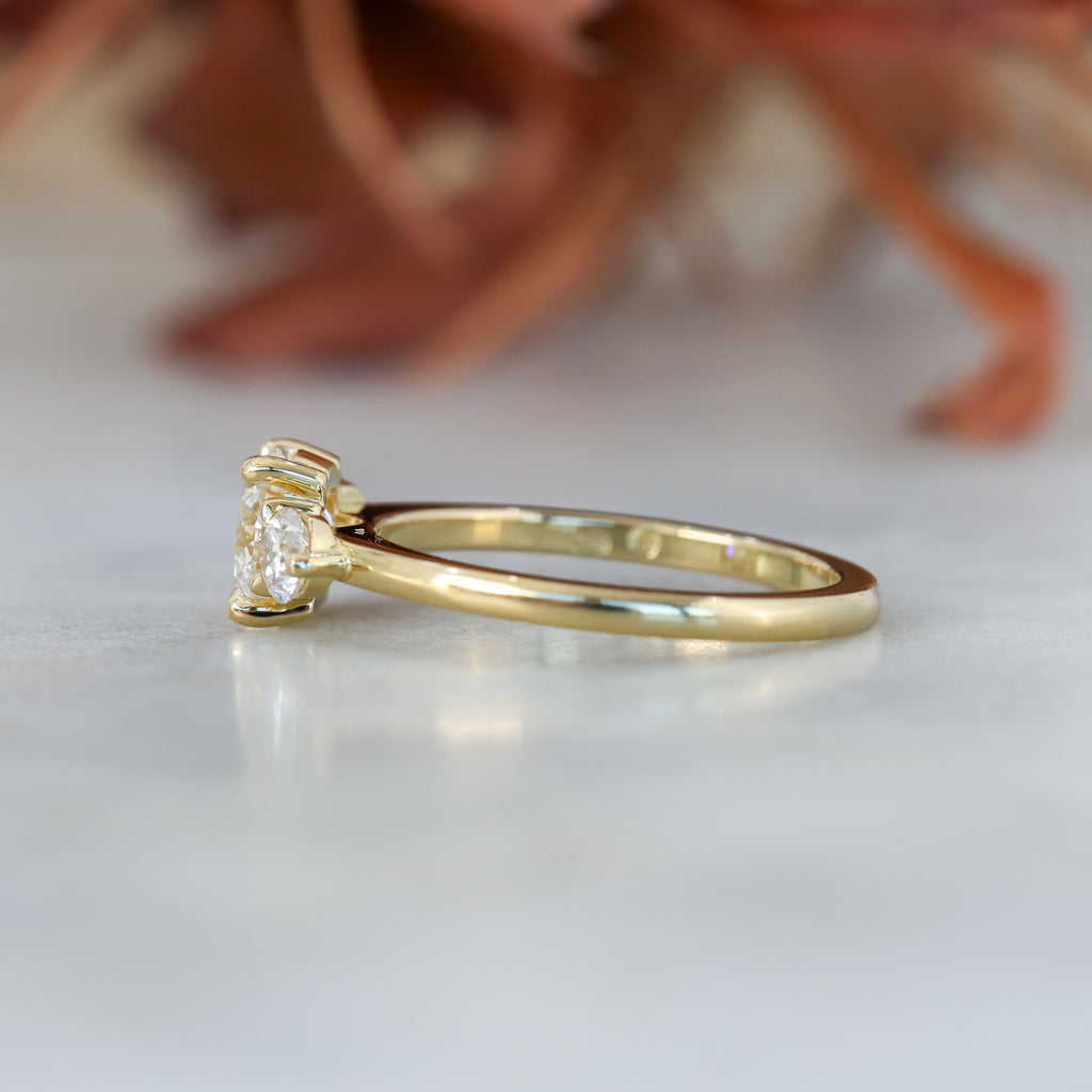 diamond round cut trilogy engagement ring yellow gold