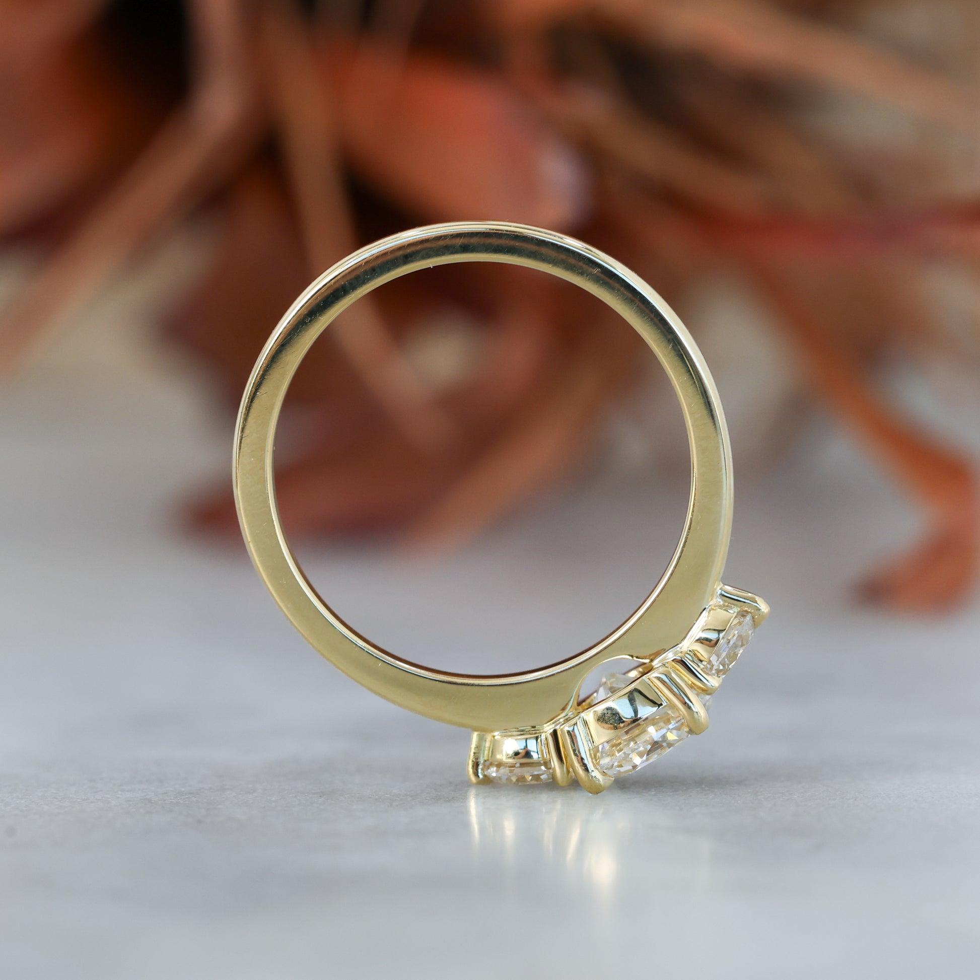 diamond round cut trilogy engagement ring yellow gold