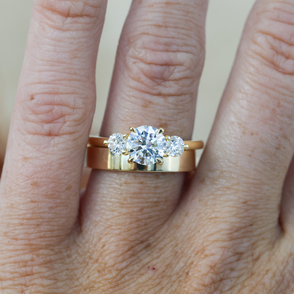 diamond round cut trilogy engagement ring yellow gold