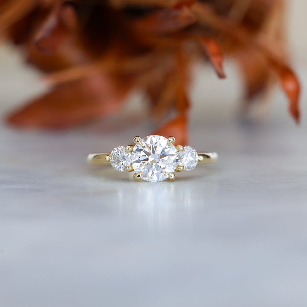 1.34ct round cut diamond lunar trilogy engagement ring