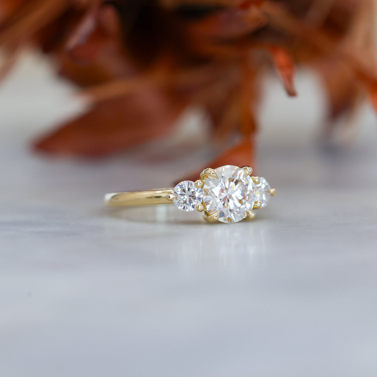 1.34ct round cut diamond lunar trilogy engagement ring