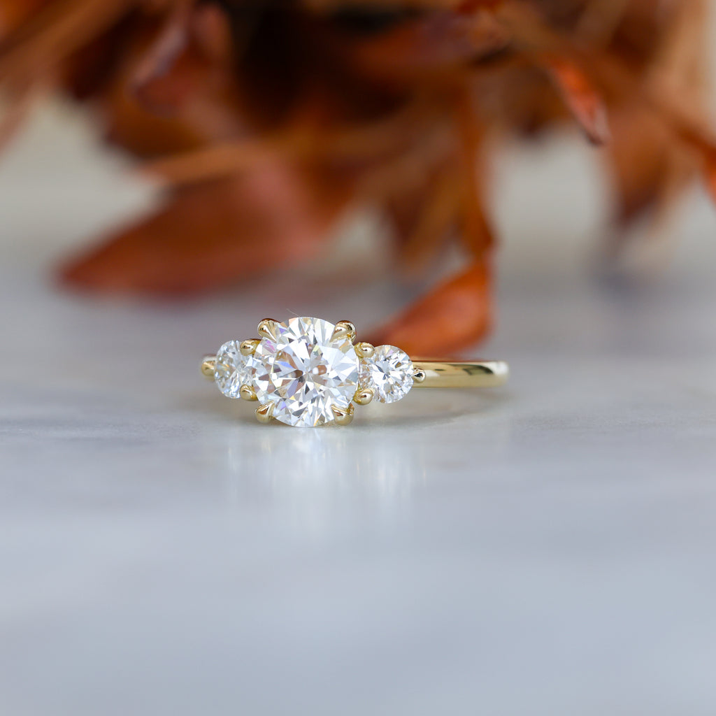 1.34ct round cut diamond lunar trilogy engagement ring