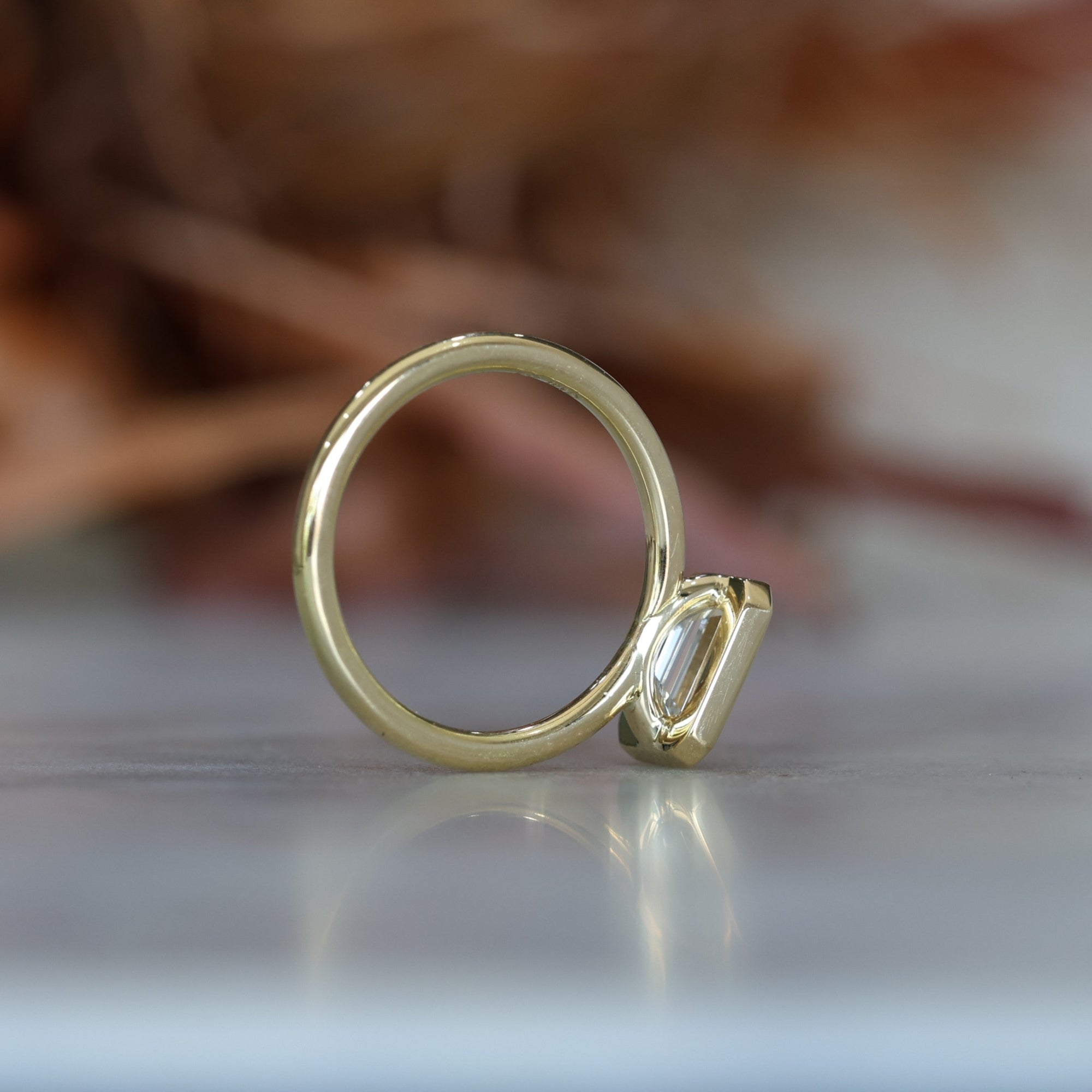 1.36ct Emerald Cut Bezel Engagement ring profile view