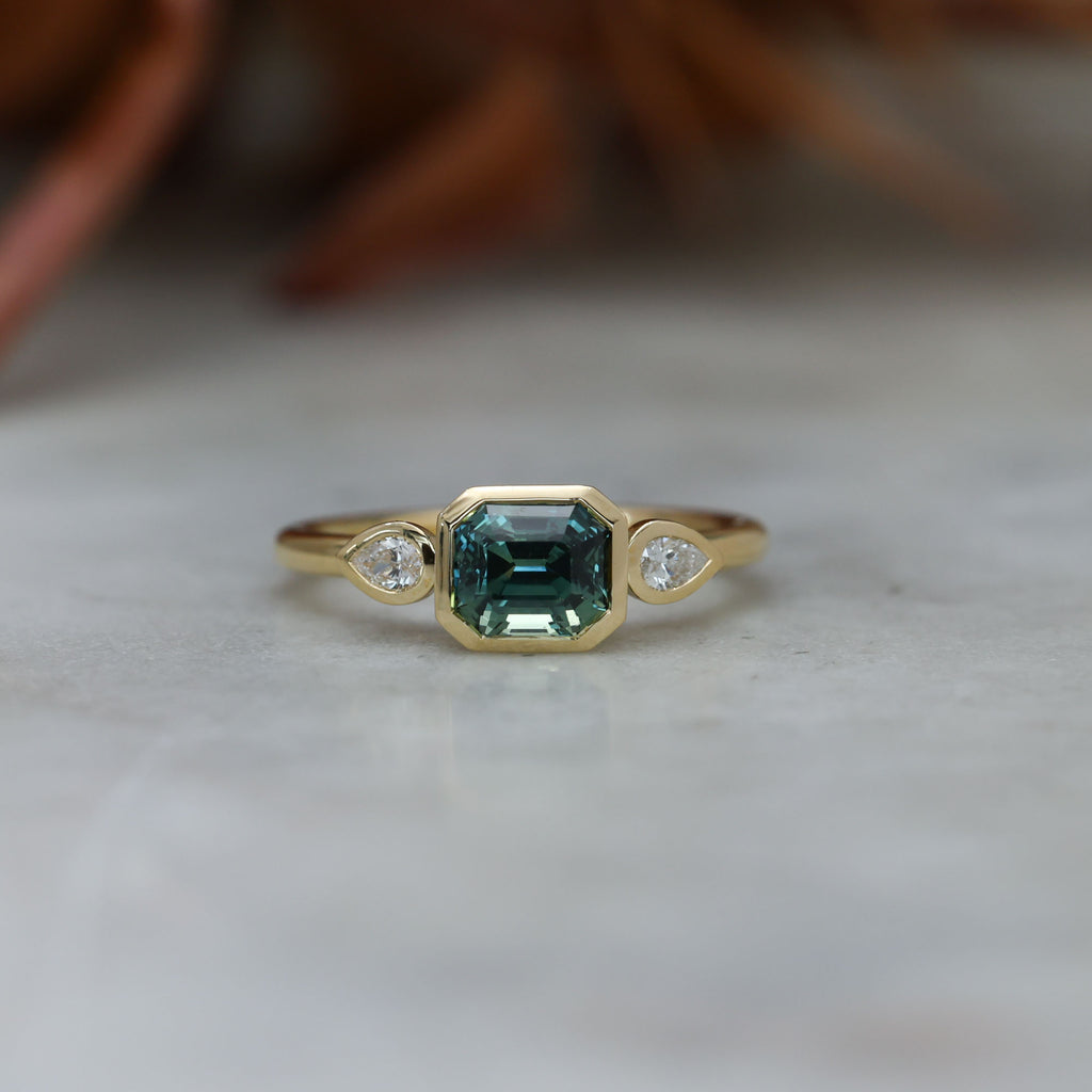 1.51ct Madagascan Sapphire Bezel trilogy engagement ring