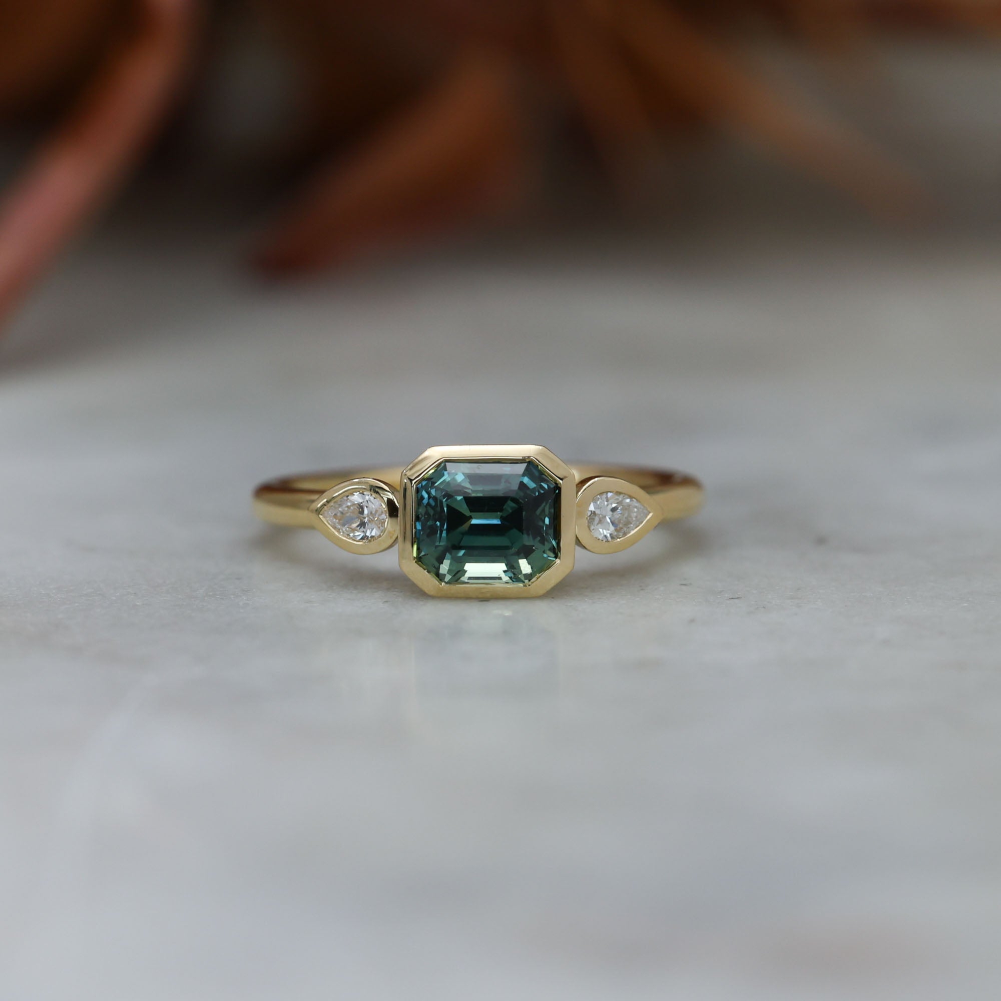 1.51ct Madagascan Sapphire Bezel trilogy engagement ring