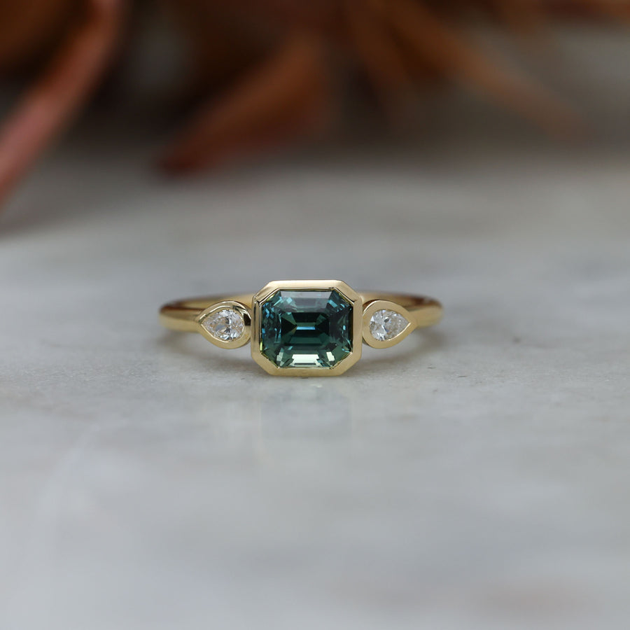 1.51ct Madagascan Sapphire Bezel trilogy engagement ring