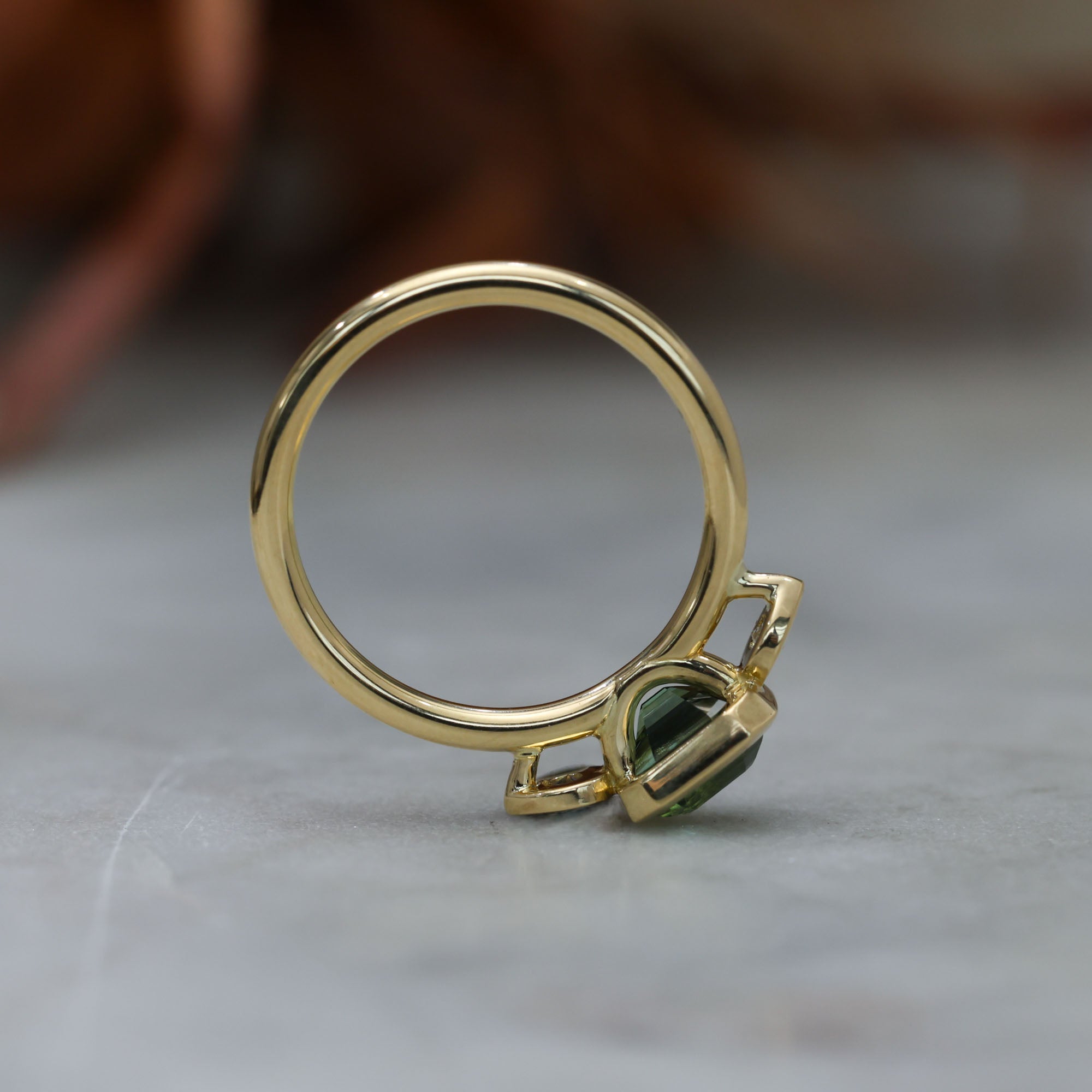 1.51ct Madagascan Sapphire Bezel Trilogy ring profile view