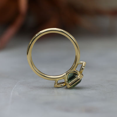 1.51ct Madagascan Sapphire Bezel Trilogy ring profile view