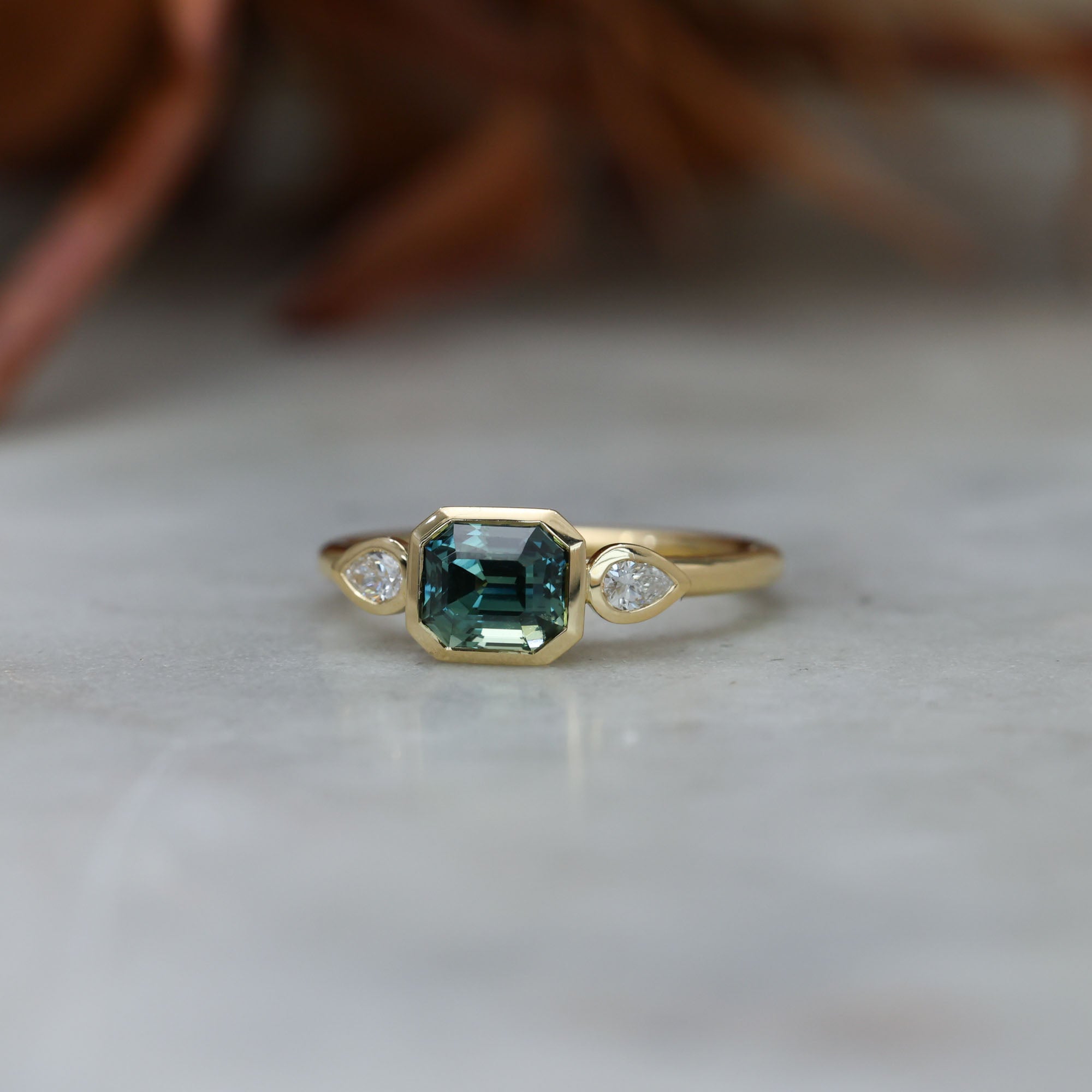 1.51ct Madagascan Sapphire Bezel Trilogy ring