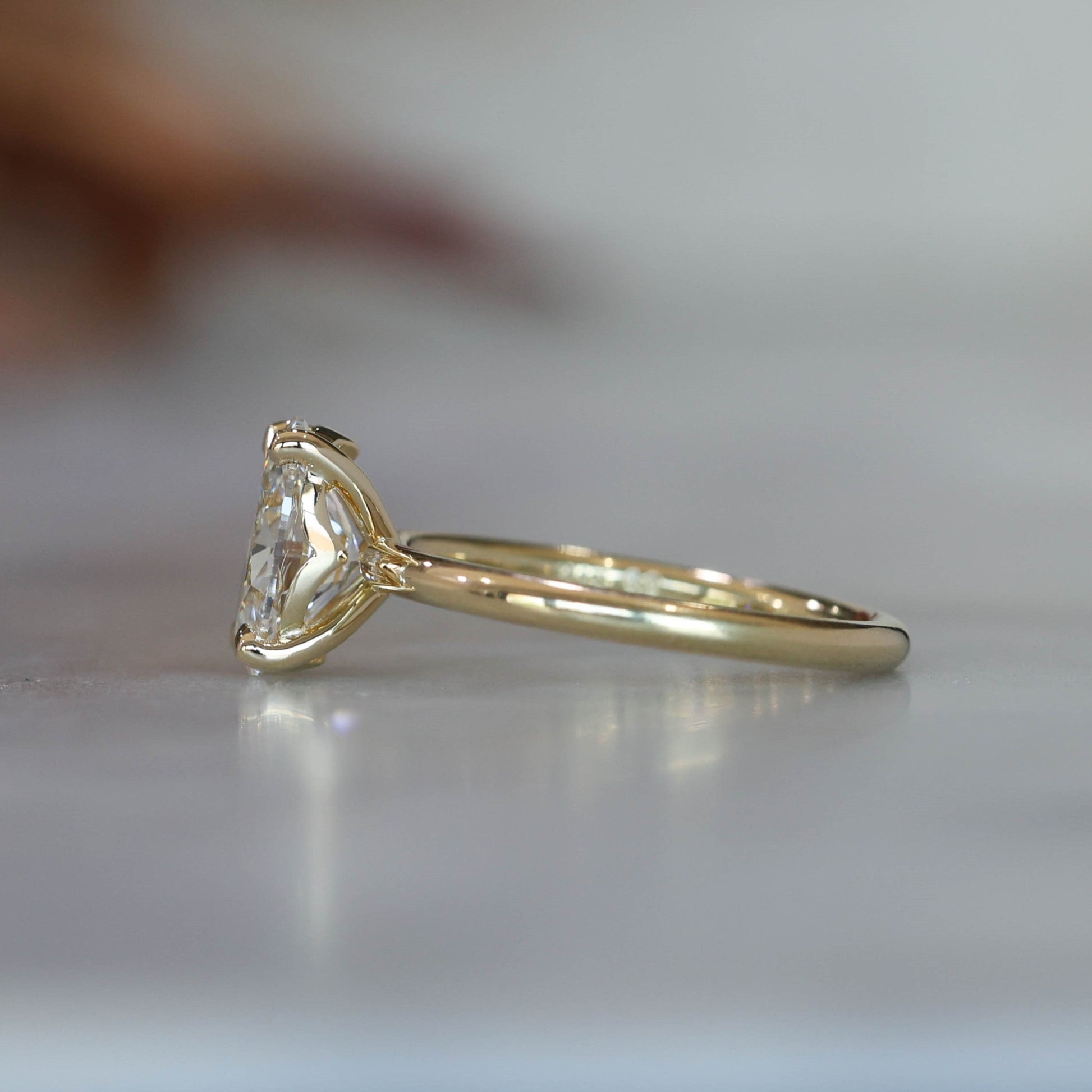 1.59ct Oval cut diamond solitaire engagement ring side view