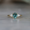 OVAL CUT TEAL SAPPHIRE / TRILOGY RING