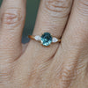 OVAL CUT TEAL SAPPHIRE / TRILOGY RING