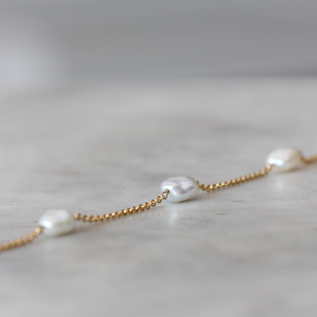 3 pearl bracelet yellow gold