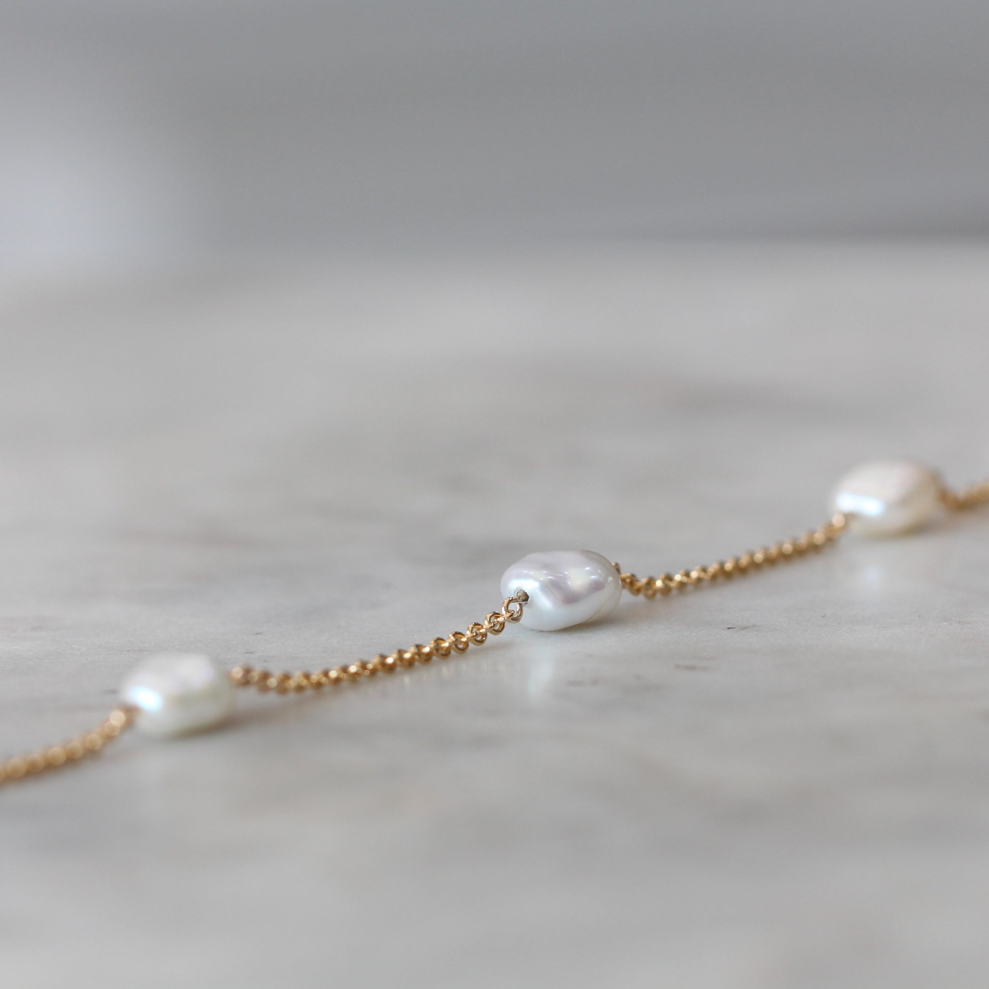 3 pearl bracelet yellow gold