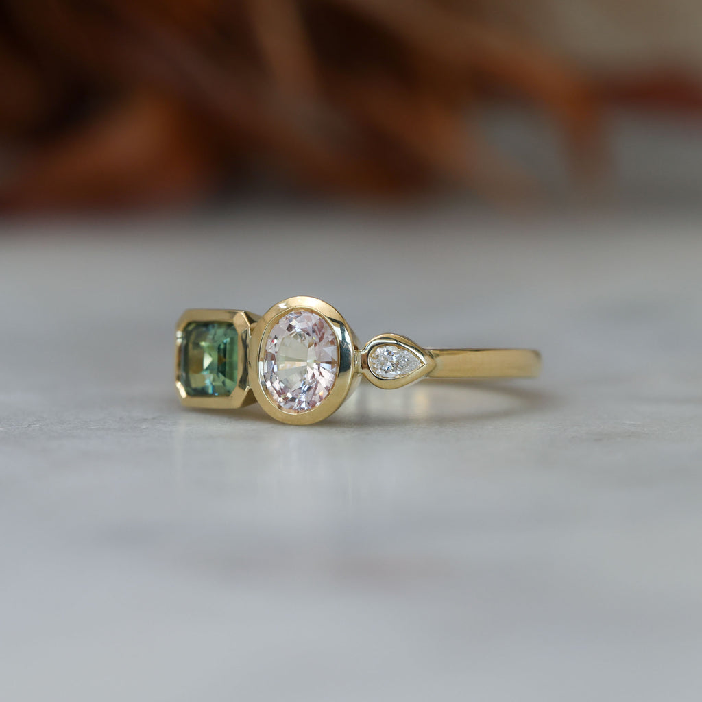 Sapphire and diamond asymmetric cluster ring, crafted in 18ct yellow gold