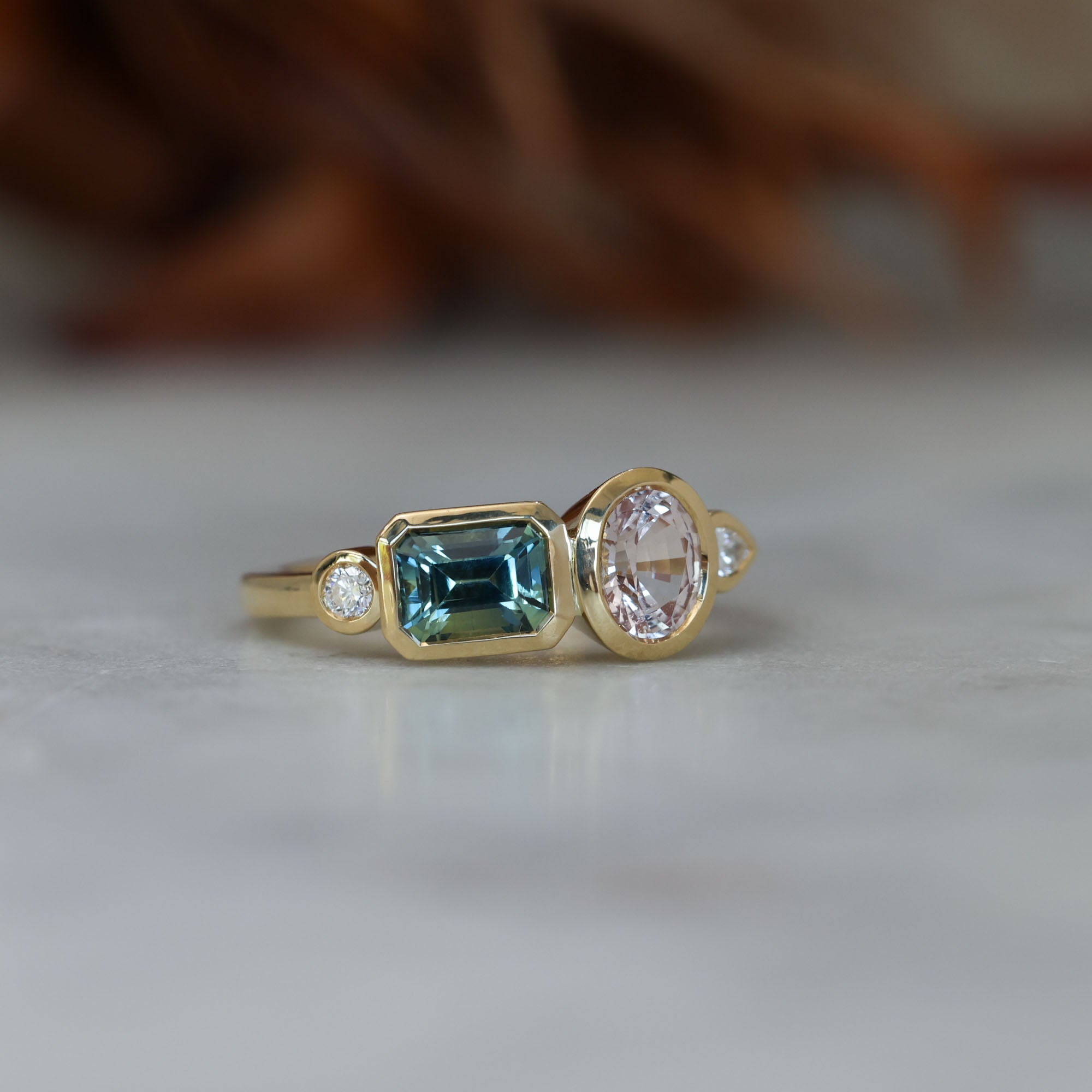 Sapphire and diamond asymmetric cluster ring, crafted in 18ct yellow gold