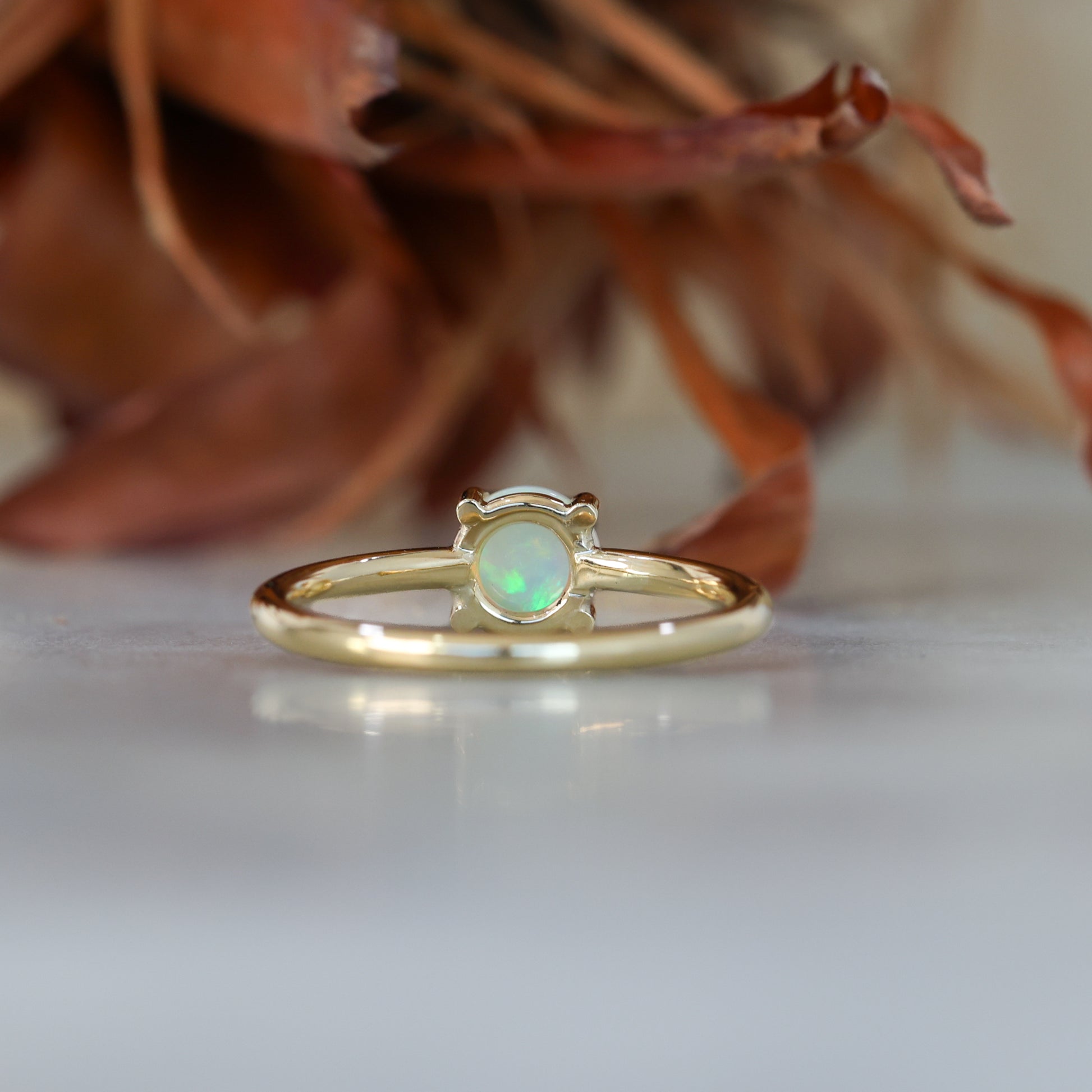 6mm round cut Australian opal ring yellow gold
